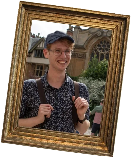 Rory, who would be your Oxford tour guide, wearing a hat. The photo is framed.